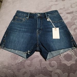 New with tag Good American high rise cut off raw hem demin shorts in size 00/24